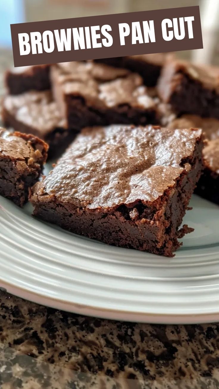 A stack of delicious brownies with a rich, dark chocolate color.