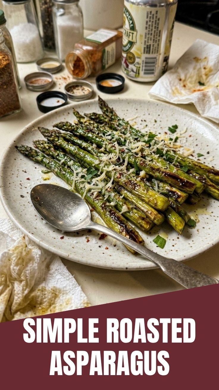 Freshly roasted asparagus spears on a serving dish